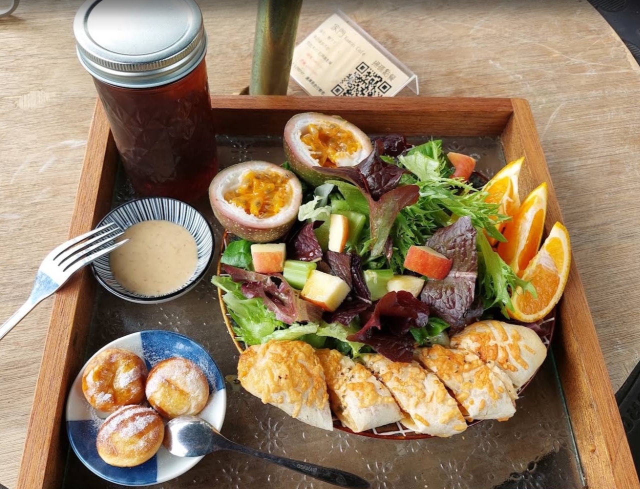 Seasonal brunch tray with fruit, salad and bread