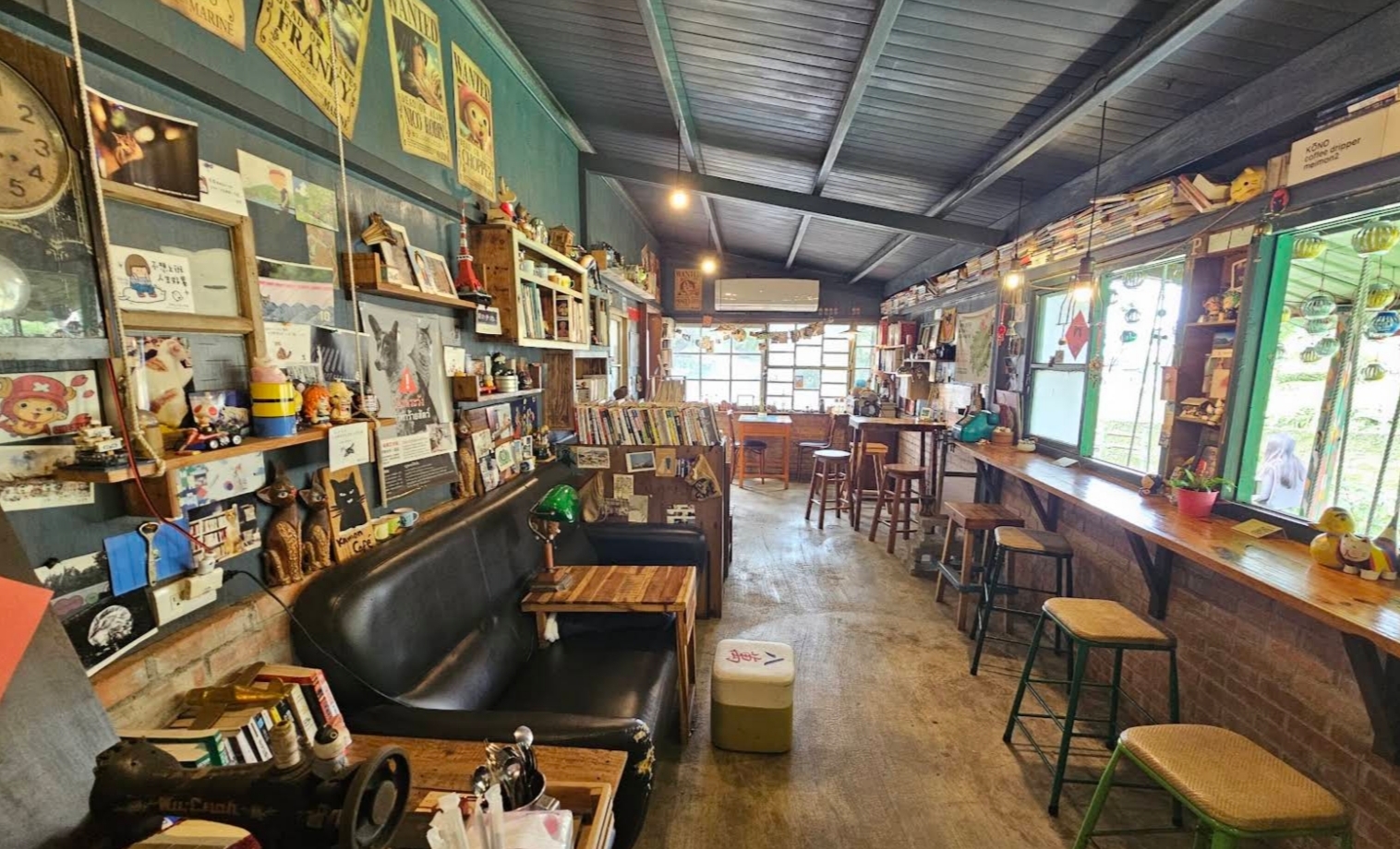 The warm, book-filled interior of Kamon Café